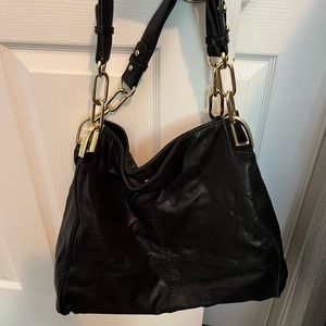 Beautiful, soft as butter black bag in great condition. Goes with everything.